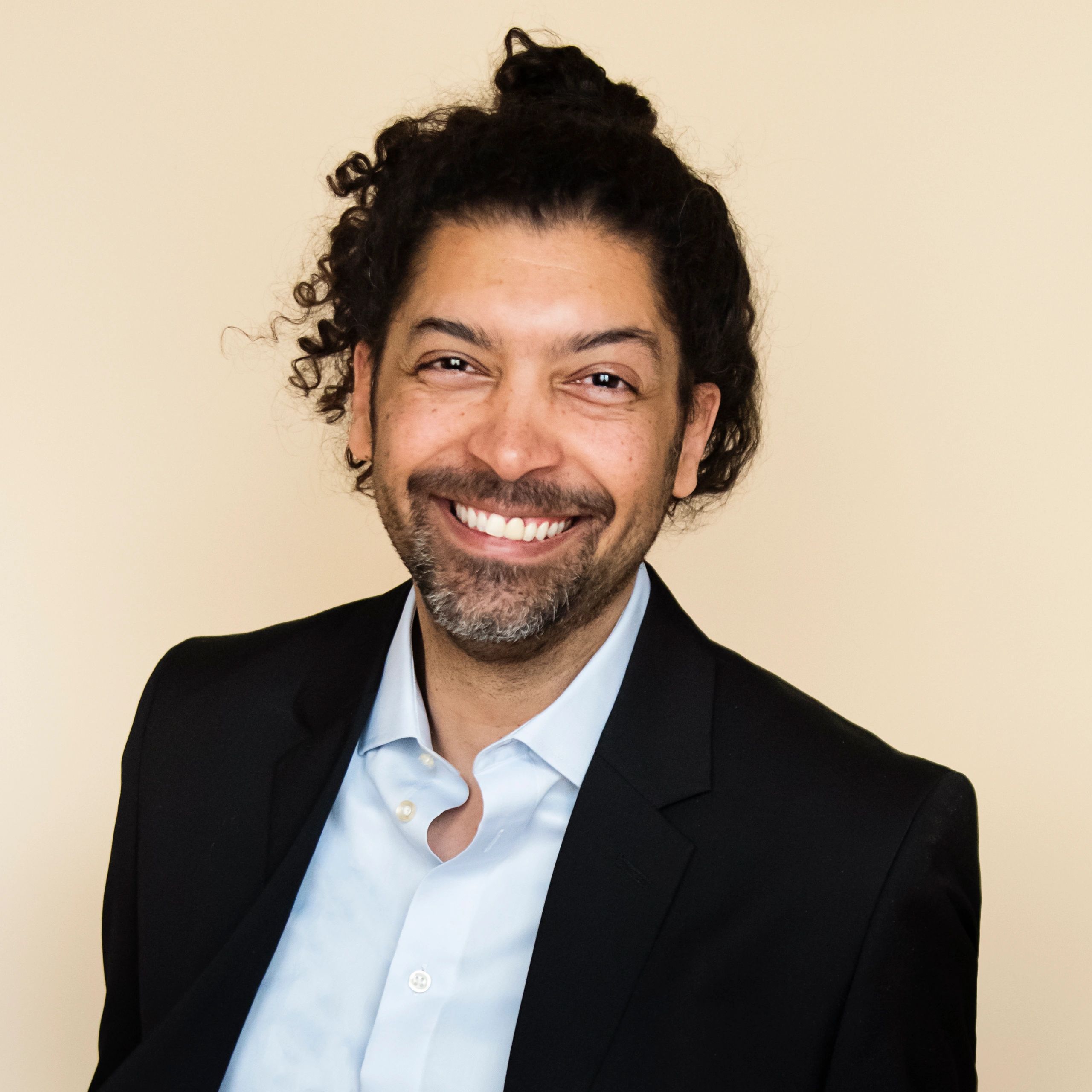 Professional headshot representing an applied AI lead