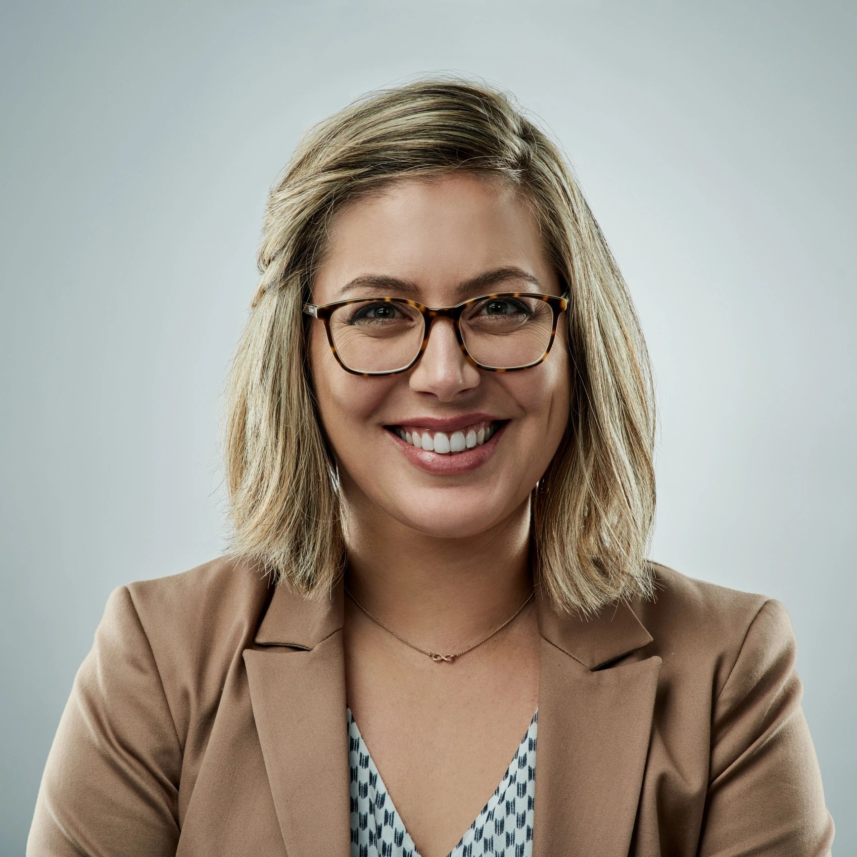 Professional headshot representing an implementation lead